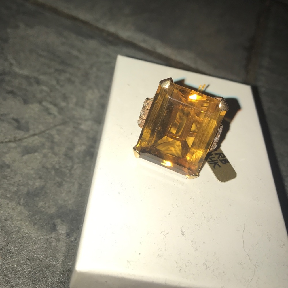 Beautiful Ring With a stone and diamonds